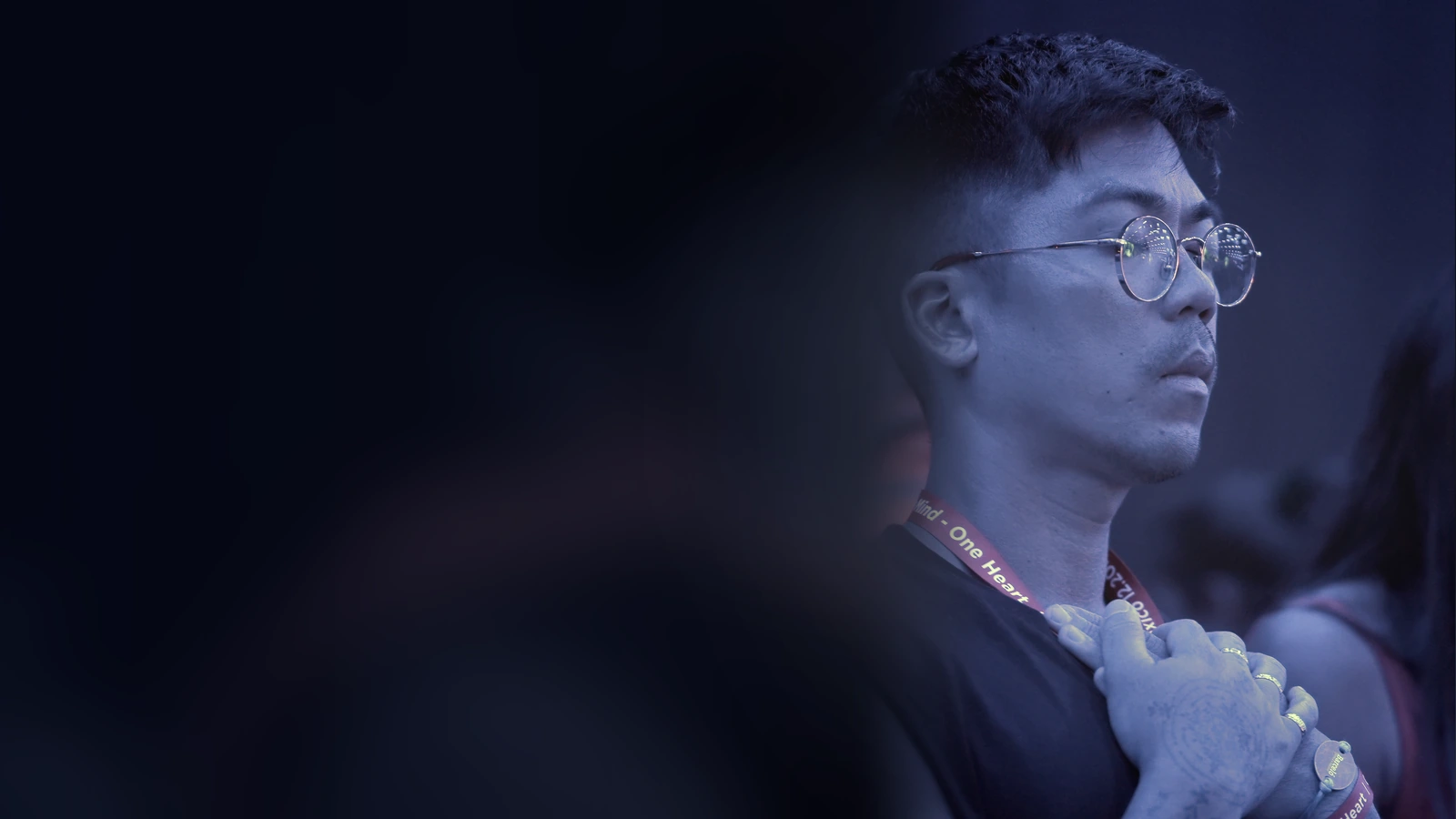 Kevin Gonzales speaking at a live session, hand over his heart